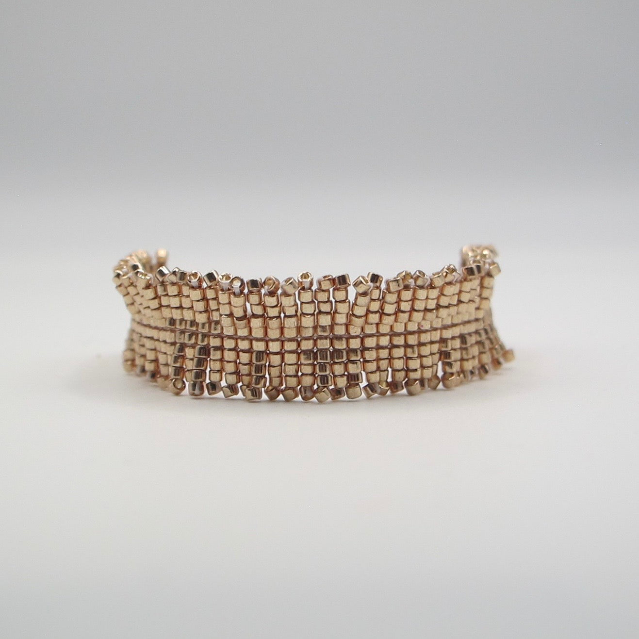 PULSERA SENDA DORADA